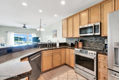 Tiny photo for 700 Ocean Drive #Unit 104, Oak Island, NC 28465 (MLS # 100606188)