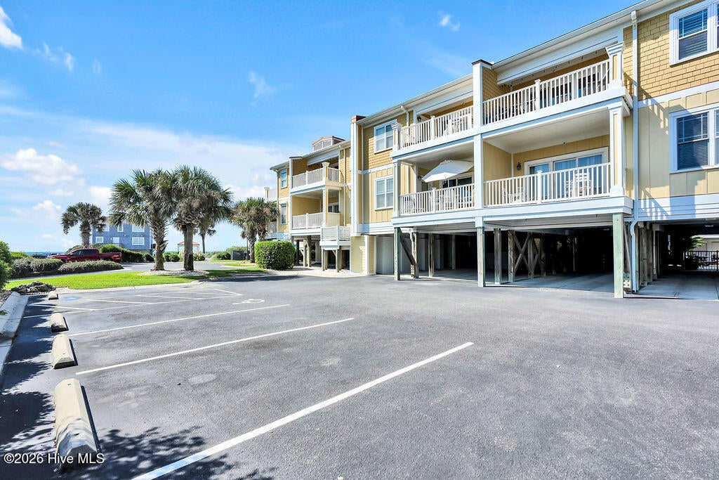 Photo of 700 Ocean Drive #Unit 104, Oak Island, NC 28465 (MLS # 100606188)