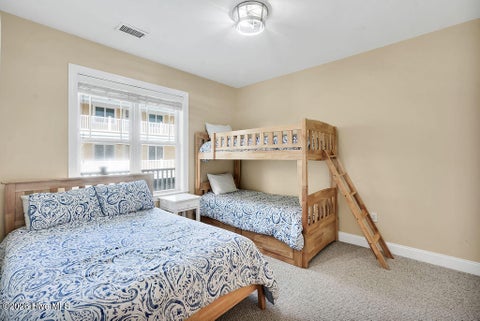 Tiny photo for 700 Ocean Drive #Unit 104, Oak Island, NC 28465 (MLS # 100606188)