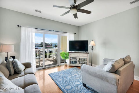 Tiny photo for 700 Ocean Drive #Unit 104, Oak Island, NC 28465 (MLS # 100606188)