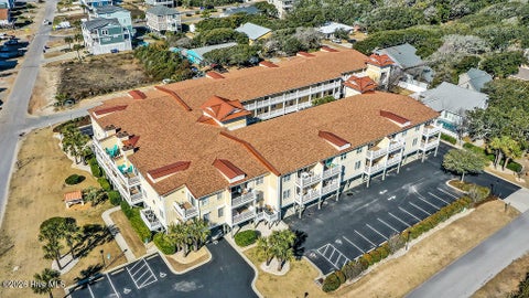 Tiny photo for 700 Ocean Drive #Unit 104, Oak Island, NC 28465 (MLS # 100606188)