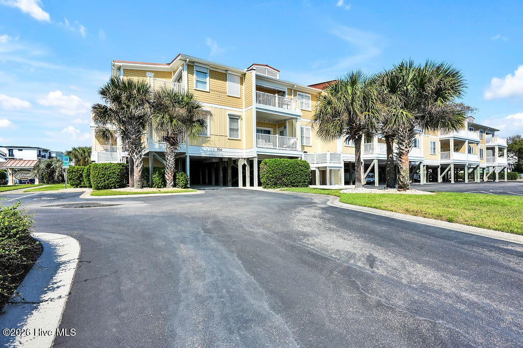 Photo of 700 Ocean Drive #Unit 104, Oak Island, NC 28465 (MLS # 100606188)