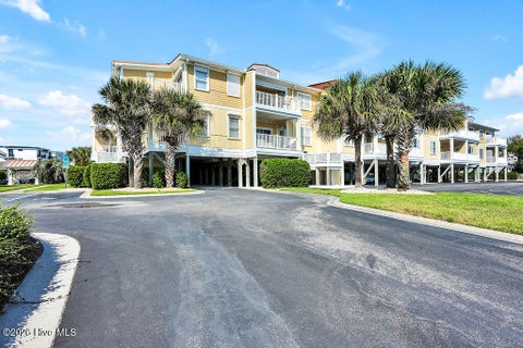 Tiny photo for 700 Ocean Drive #Unit 104, Oak Island, NC 28465 (MLS # 100606188)