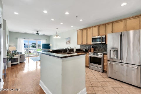 Tiny photo for 700 Ocean Drive #Unit 104, Oak Island, NC 28465 (MLS # 100606188)