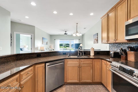 Tiny photo for 700 Ocean Drive #Unit 104, Oak Island, NC 28465 (MLS # 100606188)