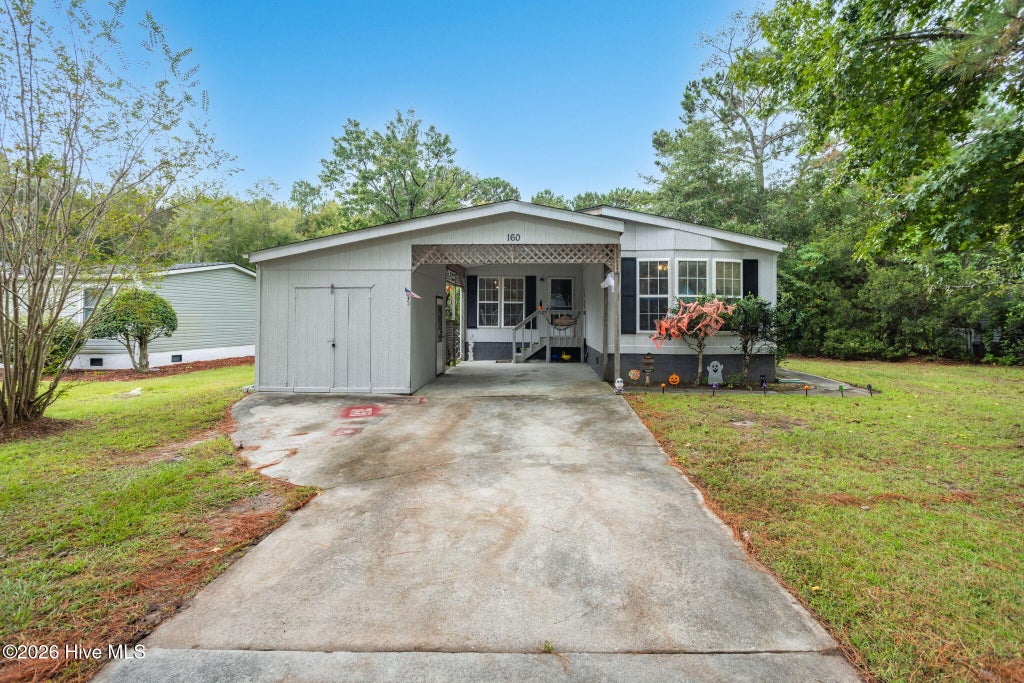 Photo of 160 Champion Drive, Hampstead, NC 28443 (MLS # 100611694)