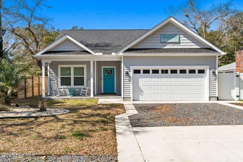 Photo of 135 NW 7th Street, Oak Island, NC 28465 (MLS # 100568020)