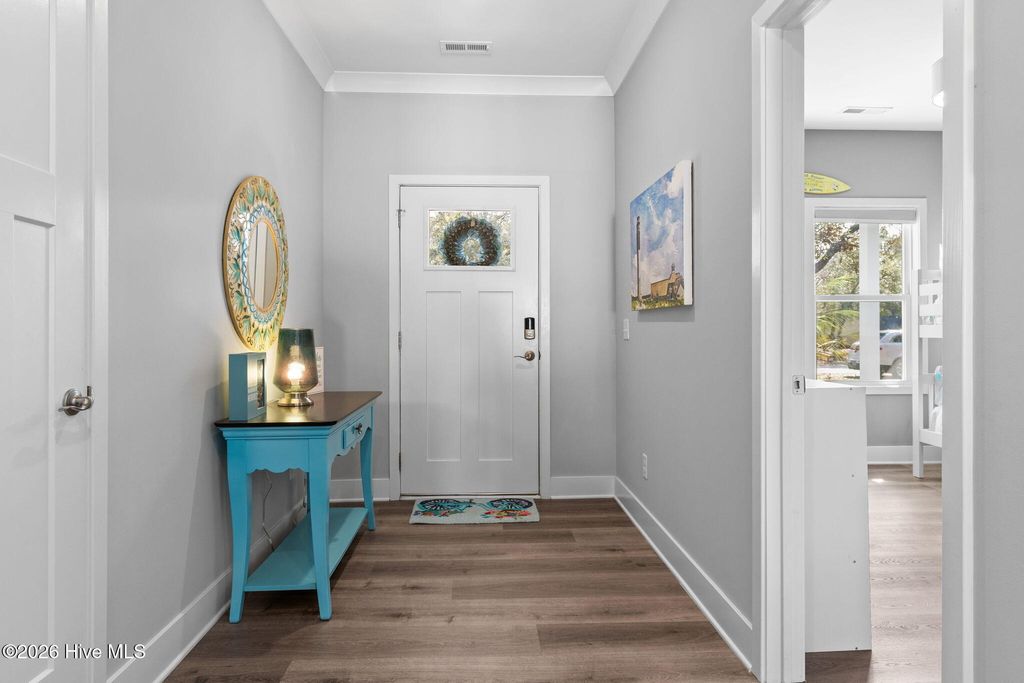 Photo of 135 NW 7th Street, Oak Island, NC 28465 (MLS # 100568020)