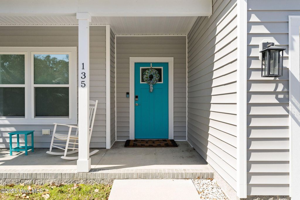 Photo of 135 NW 7th Street, Oak Island, NC 28465 (MLS # 100568020)