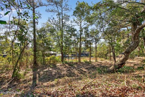 Photo of 112 SE 22nd Street, Oak Island, NC 28465 (MLS # 100556600)