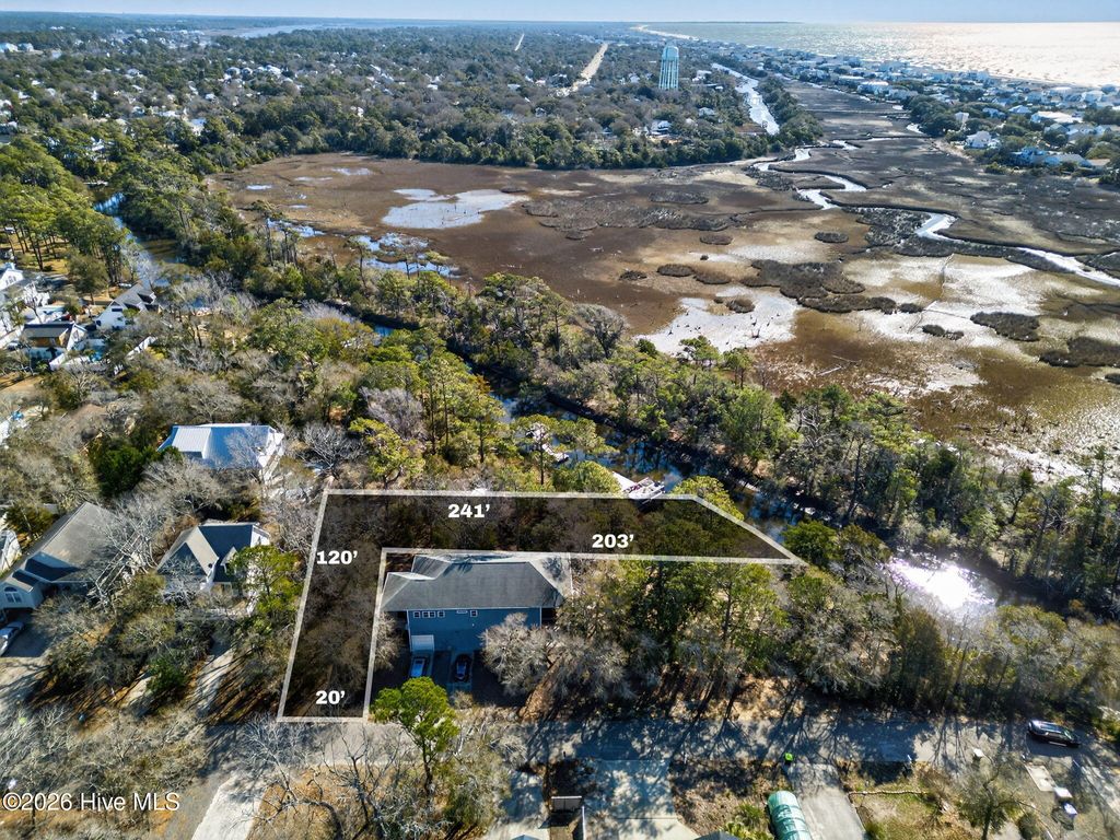 Photo of 112 SE 22nd Street, Oak Island, NC 28465 (MLS # 100556600)