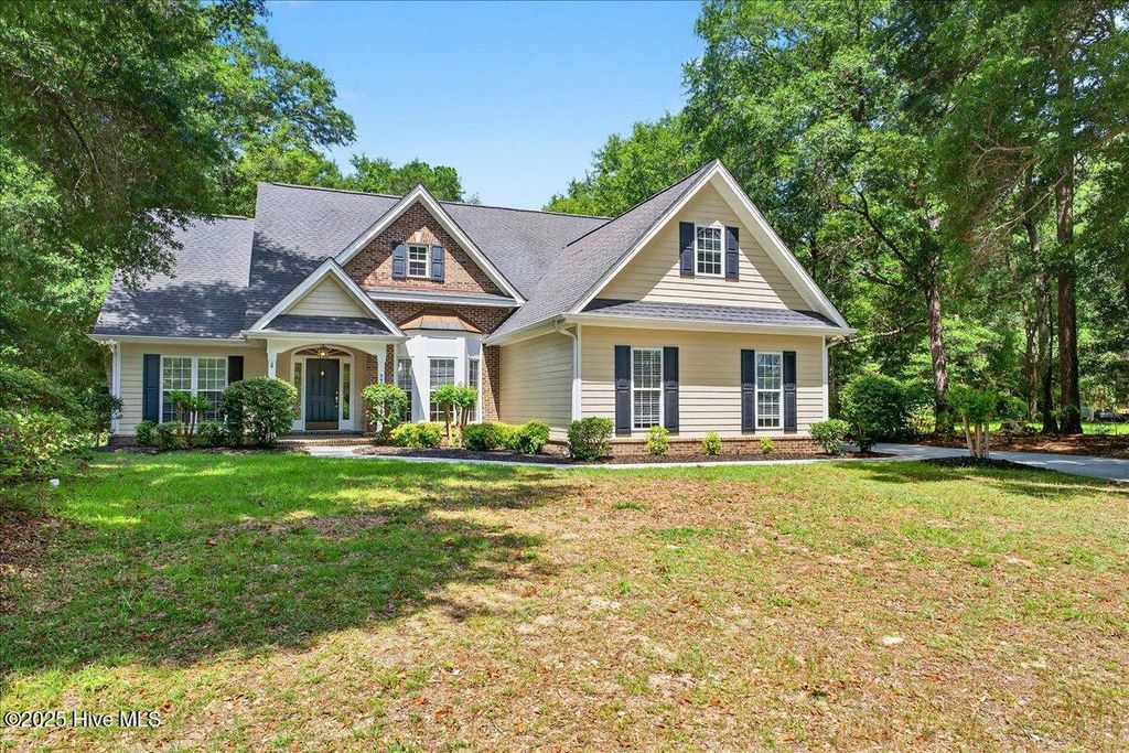 Photo of 8985 Woodbine Road SW, Sunset Beach, NC 28468 (MLS # 100519877)