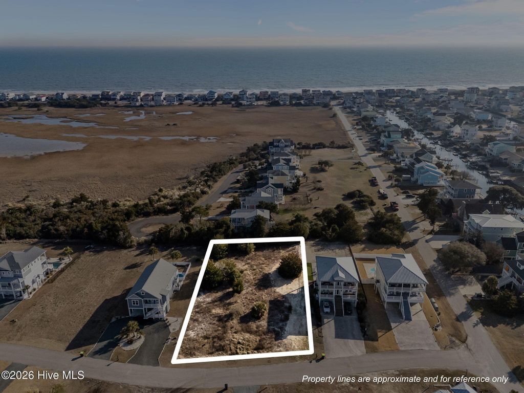 Photo of 869 Heron Landing Wynd, Holden Beach, NC 28462 (MLS # 100553415)