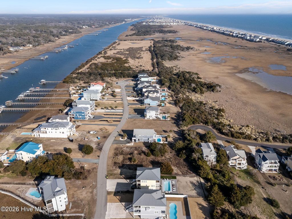 Photo of 869 Heron Landing Wynd, Holden Beach, NC 28462 (MLS # 100553415)