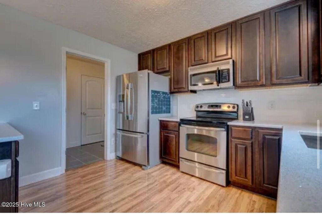 Photo of 39 Preswick Drive, Rocky Point, NC 28457 (MLS # 100563066)