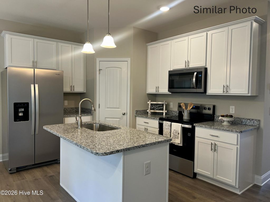 Photo of 207 Holly Sands Loop, Holly Ridge, NC 28445 (MLS # 100563790)