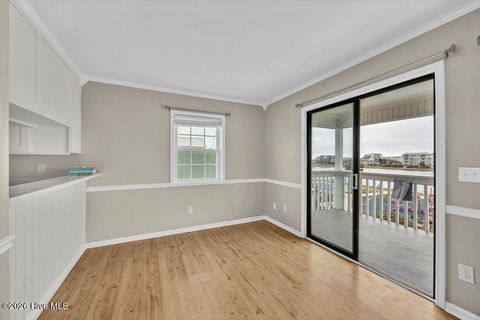 Tiny photo for 215 Atlanta Avenue #Apt 3c, Carolina Beach, NC 28428 (MLS # 100560148)