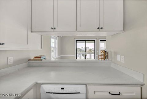 Tiny photo for 215 Atlanta Avenue #Apt 3c, Carolina Beach, NC 28428 (MLS # 100560148)