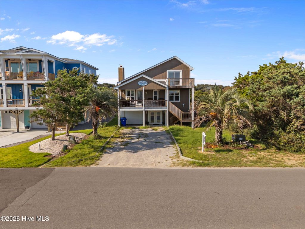 Photo of 312 E Dolphin Drive, Oak Island, NC 28465 (MLS # 100553144)