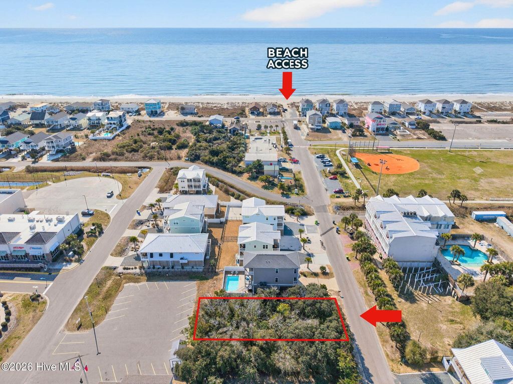 Photo of 118 SE 49th Street, Oak Island, NC 28465 (MLS # 100553915)