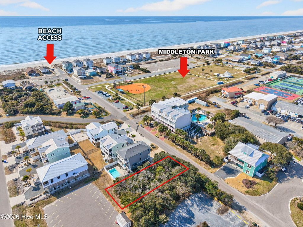 Photo of 118 SE 49th Street, Oak Island, NC 28465 (MLS # 100553915)