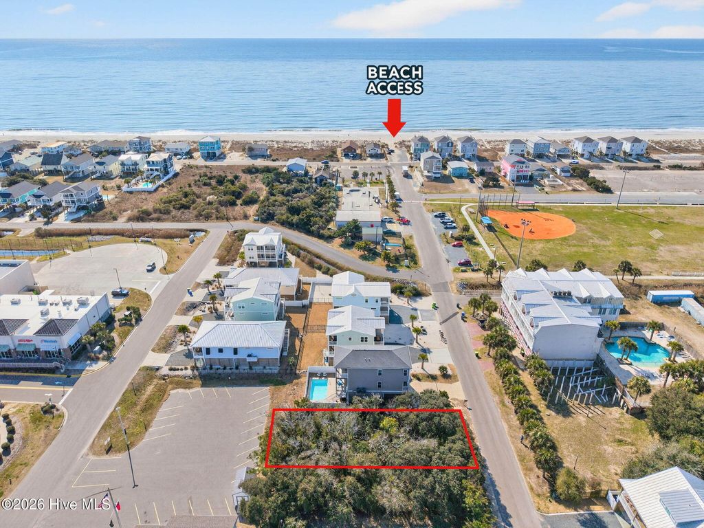 Photo of 118 SE 49th Street, Oak Island, NC 28465 (MLS # 100553915)