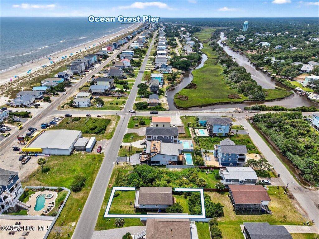 Photo of 4010 E Dolphin Drive, Oak Island, NC 28465 (MLS # 100515971)