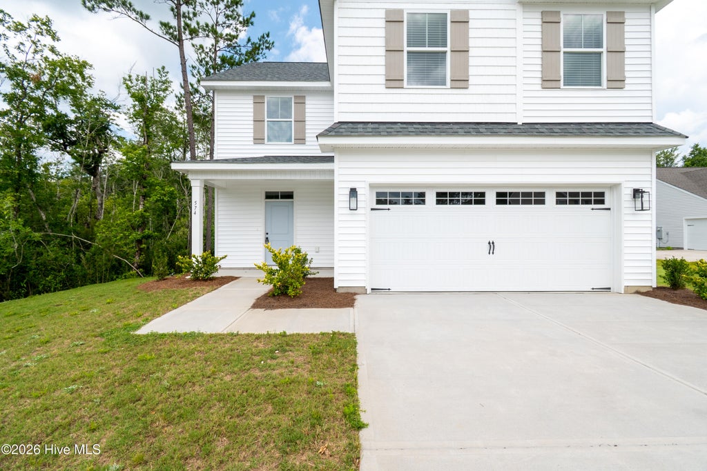 Photo of 574 Poppleton Drive, Hampstead, NC 28443 (MLS # 100585425)