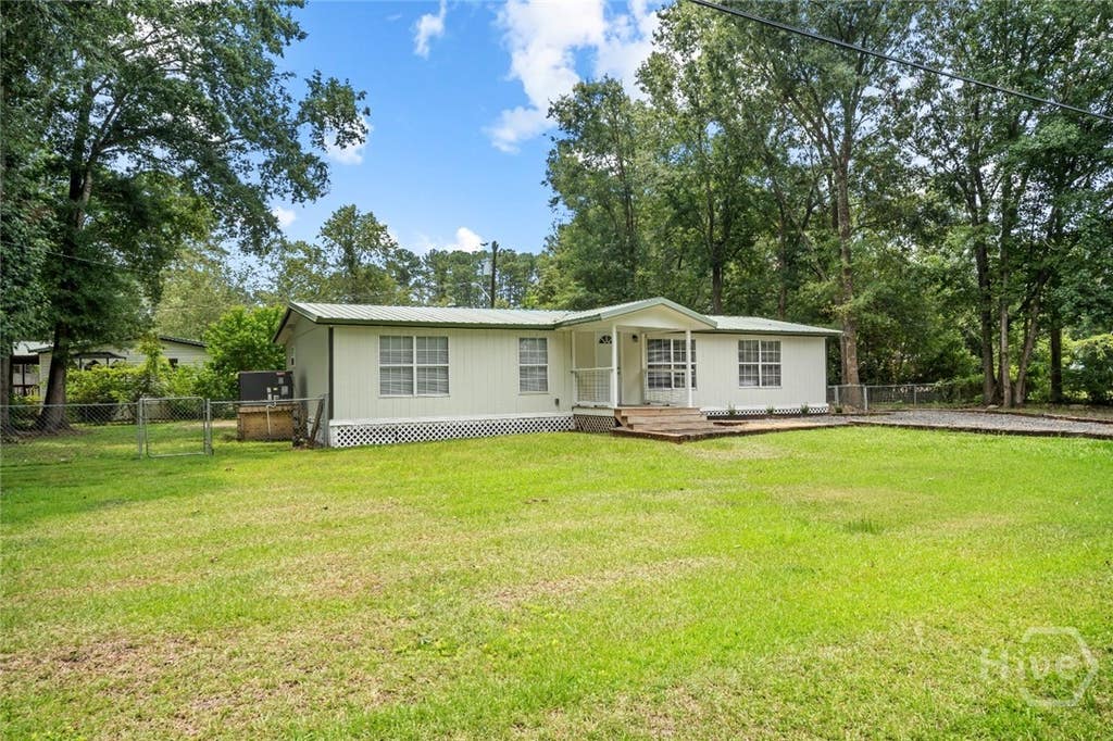 Photo of 54 Spruce St ST, Richmond Hill, GA 31324 (MLS # SA361544)