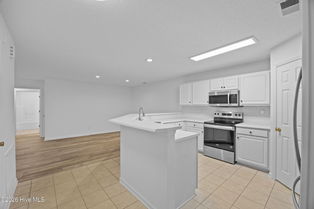Photo of 5006 Hunters Trail #Unit 9, Wilmington, NC 28405 (MLS # 100571593)