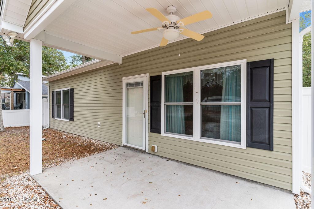 Photo of 112 NW 3rd Street, Oak Island, NC 28465 (MLS # 100543920)
