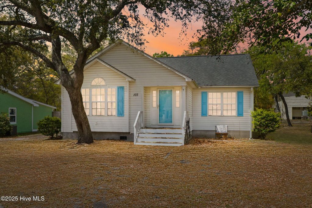 Photo of 103 NE 5th Street, Oak Island, NC 28465 (MLS # 100558443)