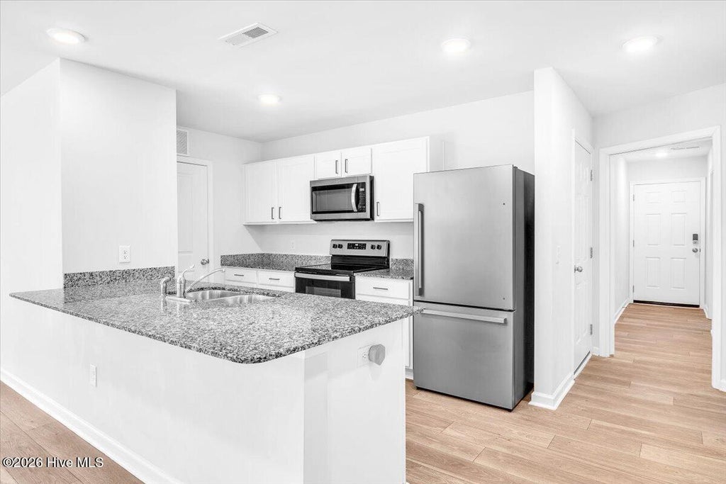 Photo of 2170 Bayside Drive SW, Supply, NC 28462 (MLS # 100586147)