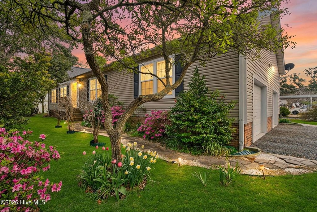 Photo of 110 NE 67th Street, Oak Island, NC 28465 (MLS # 100557070)