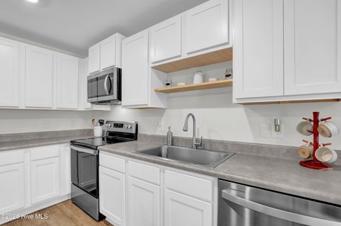 Tiny photo for 1014 Course Lane, Surf City, NC 28455 (MLS # 100586272)