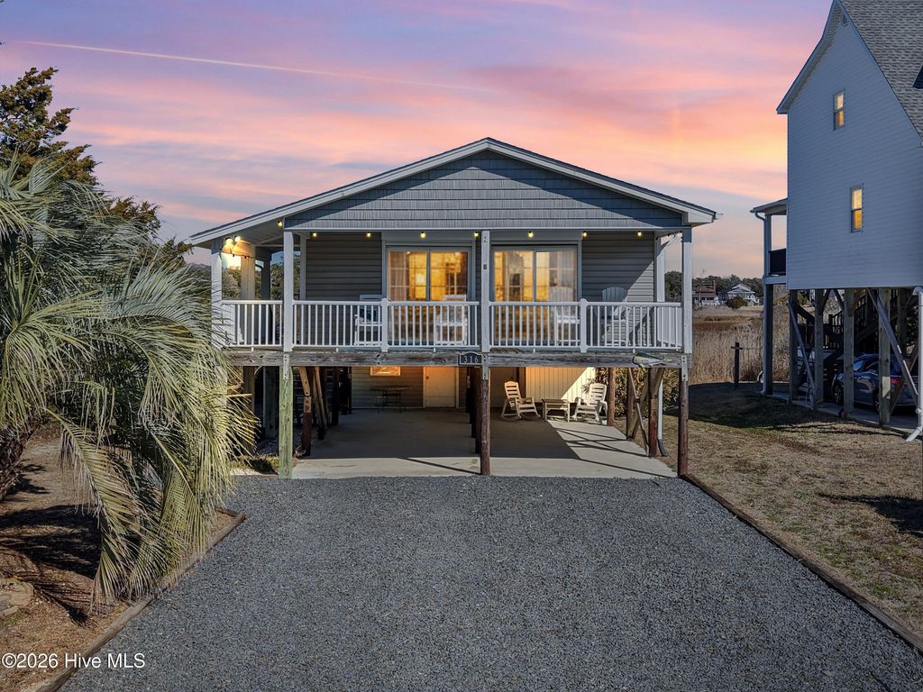 Photo of 316 E Dolphin Drive, Oak Island, NC 28465 (MLS # 100555646)