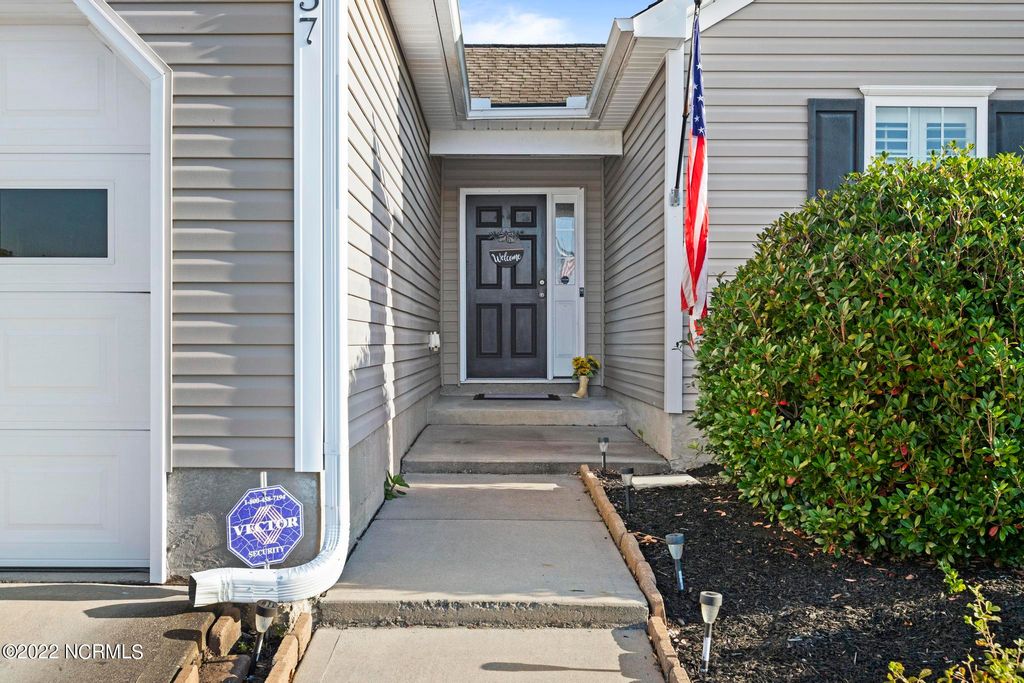 Photo of 337 Rose Bud Lane, Holly Ridge, NC 28445 (MLS # 100545089)