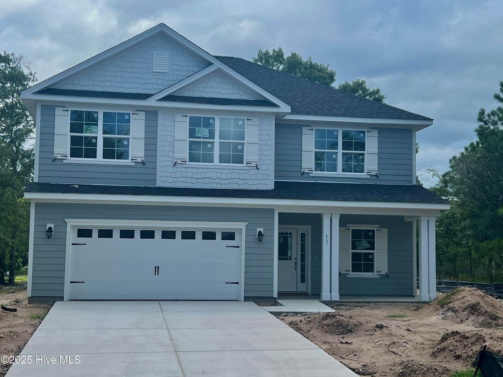 Photo of 3121 Burberry Lane SW, Shallotte, NC 28470 (MLS # 100509946)