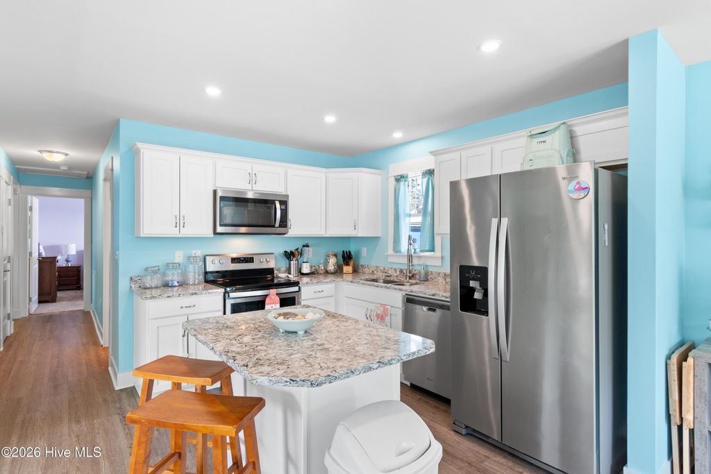 Photo of 229 NE 75th Street, Oak Island, NC 28465 (MLS # 100558691)