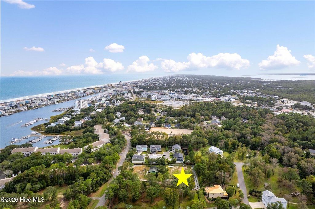 Photo of 113 Reef Road, Carolina Beach, NC 28428 (MLS # 100564384)