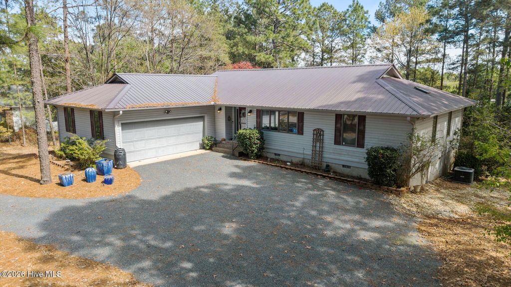 Photo of 117 Pineneedle Drive, West End, NC 27376 (MLS # 100568933)