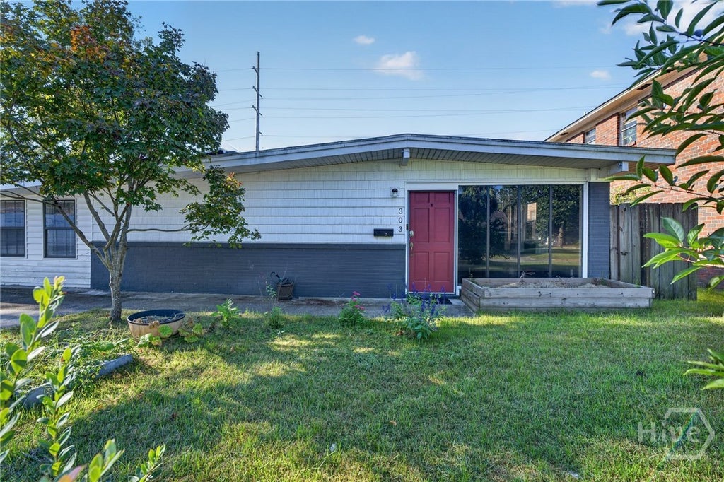 Photo of 303 E 60th Street, Savannah, GA 31405 (MLS # SA365615)