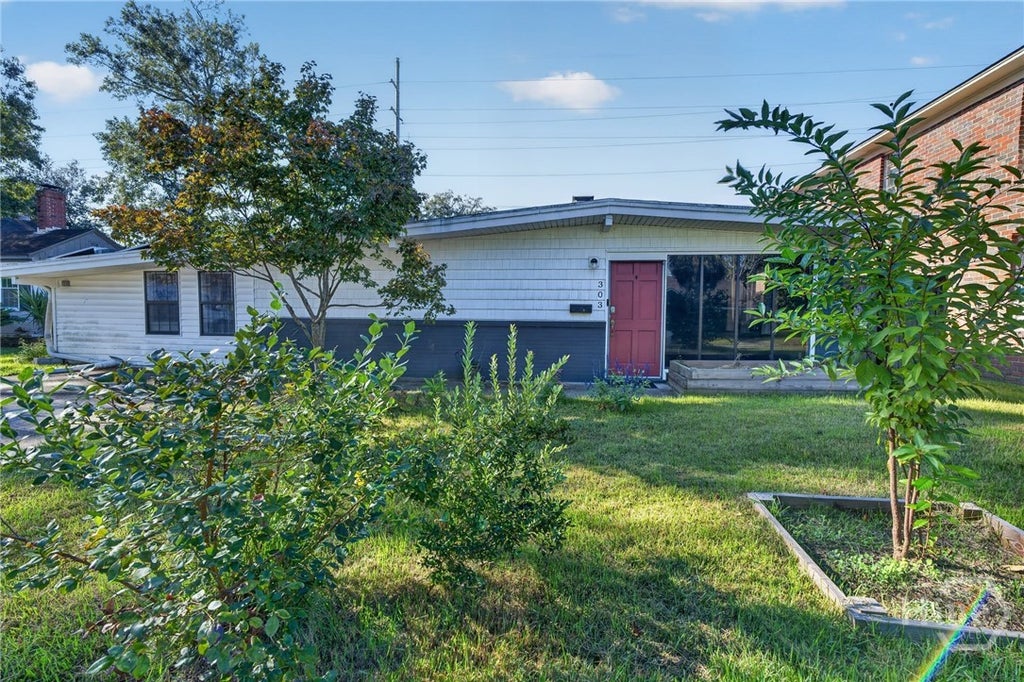 Photo of 303 E 60th Street, Savannah, GA 31405 (MLS # SA365615)