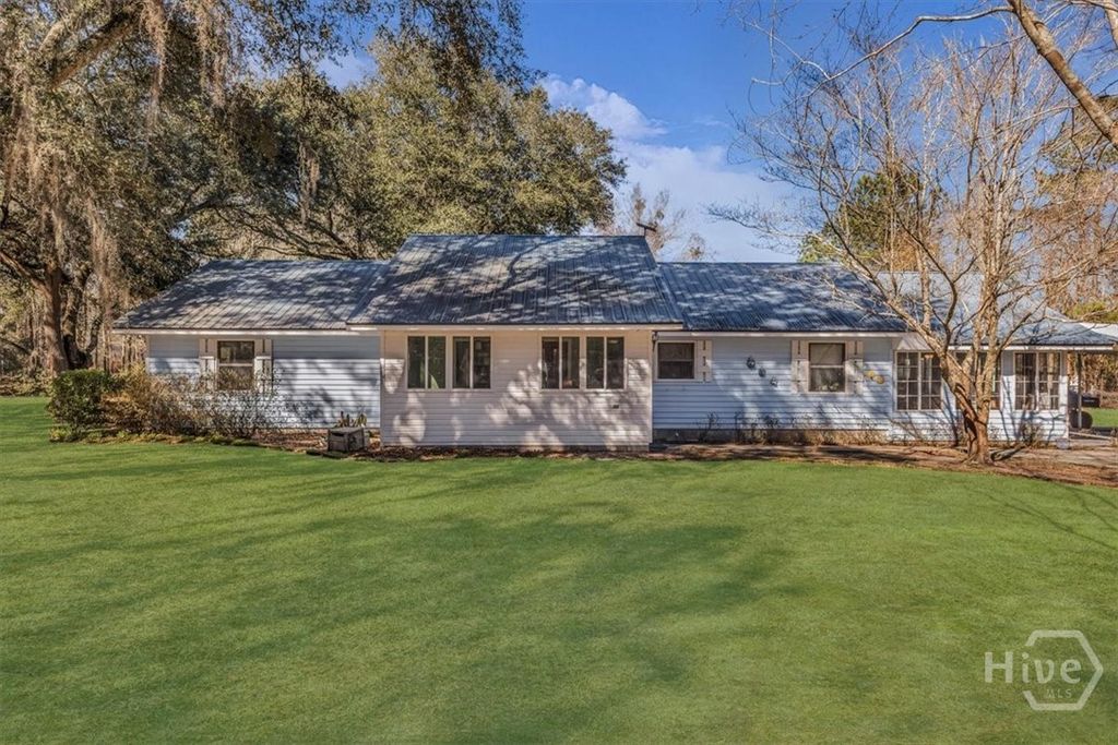 Photo of 128 William Smith Lane NE, Ludowici, GA 31316 (MLS # SA347773)