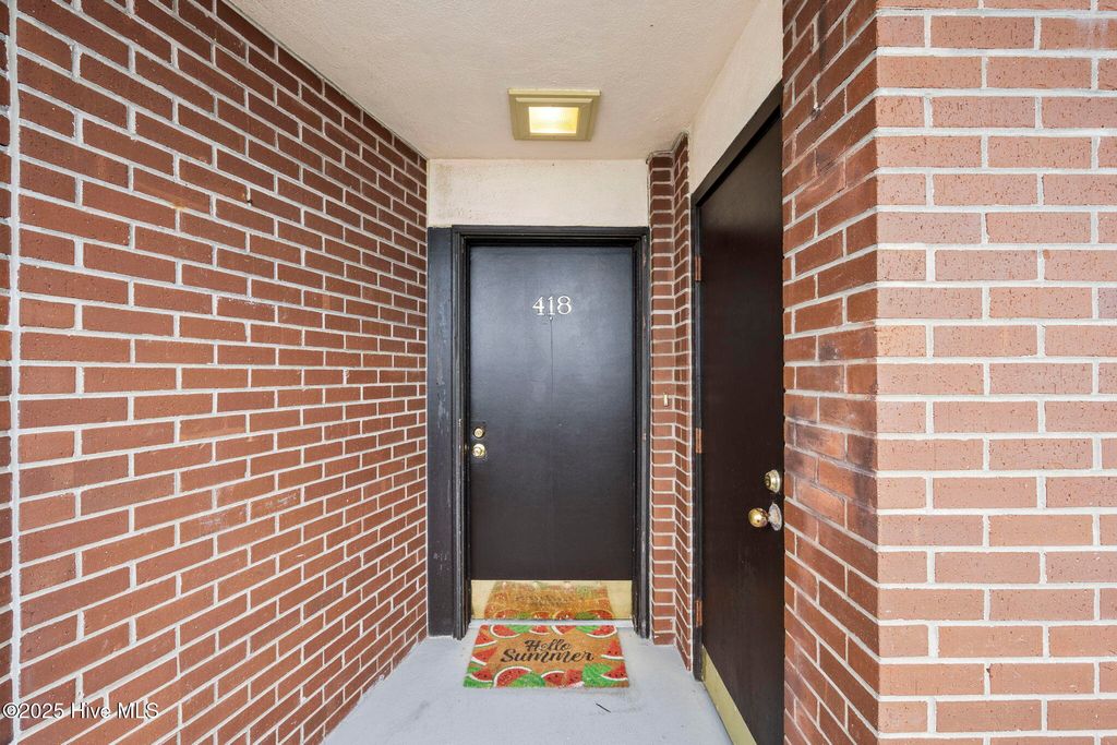 Photo of 1505 Salter Path Road #418, Indian Beach, NC 28512 (MLS # 100544710)