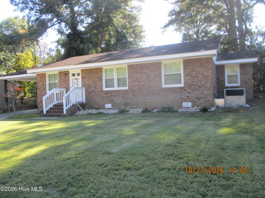 Photo of 1703 Woodside Drive W, Wilson, NC 27893 (MLS # 100612764)