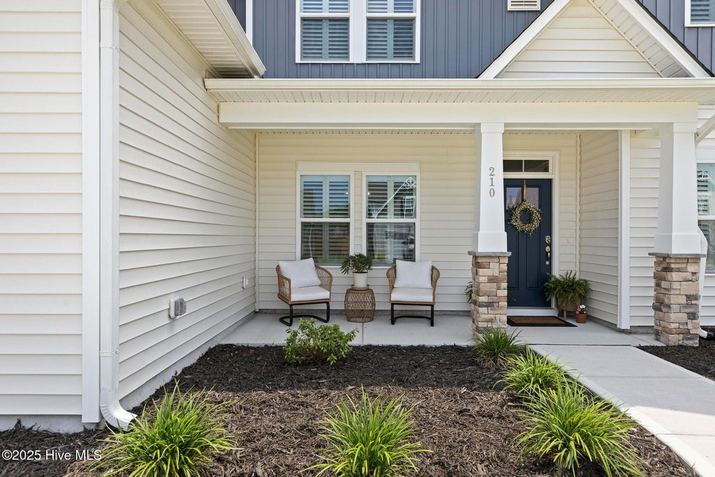 Photo of 210 W Weatherbee Way, Hampstead, NC 28443 (MLS # 100516290)