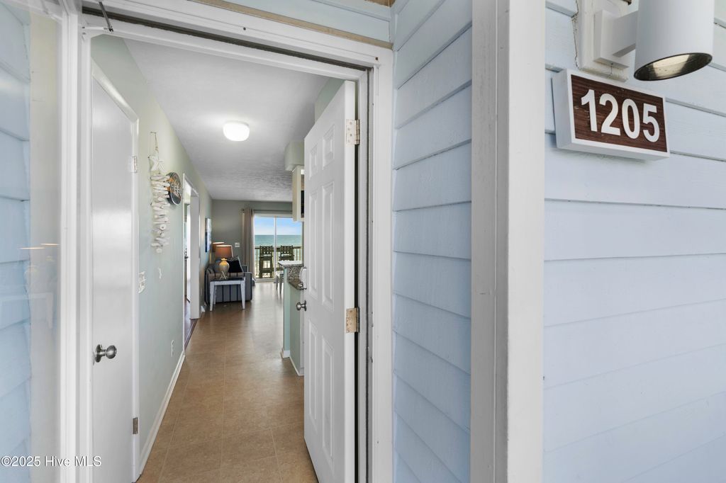 Photo of 1205 Sand Dollar Court, Kure Beach, NC 28449 (MLS # 100529078)