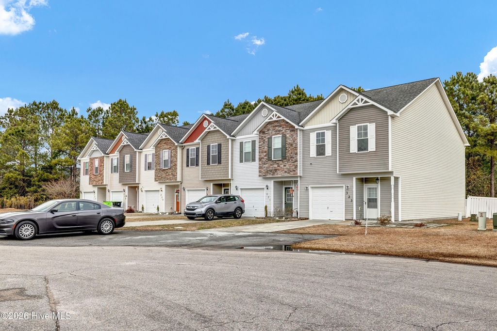 Photo of 319 Cedar Island Trail, Holly Ridge, NC 28445 (MLS # 100554208)