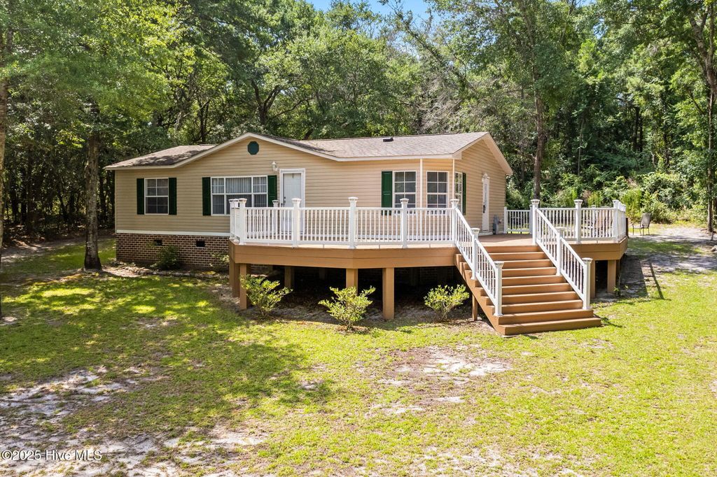 Photo of 930 Cypress Lakes Circle SE, Bolivia, NC 28422 (MLS # 100515279)